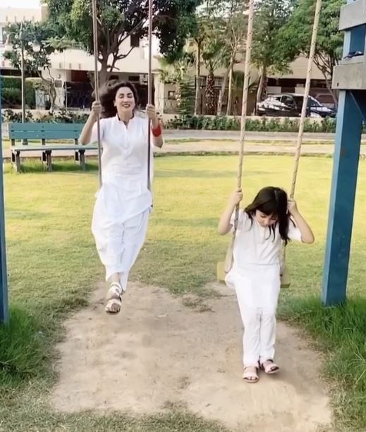 Cute Pictures of Actress Fiza Ali with her Daughter in White Dress
