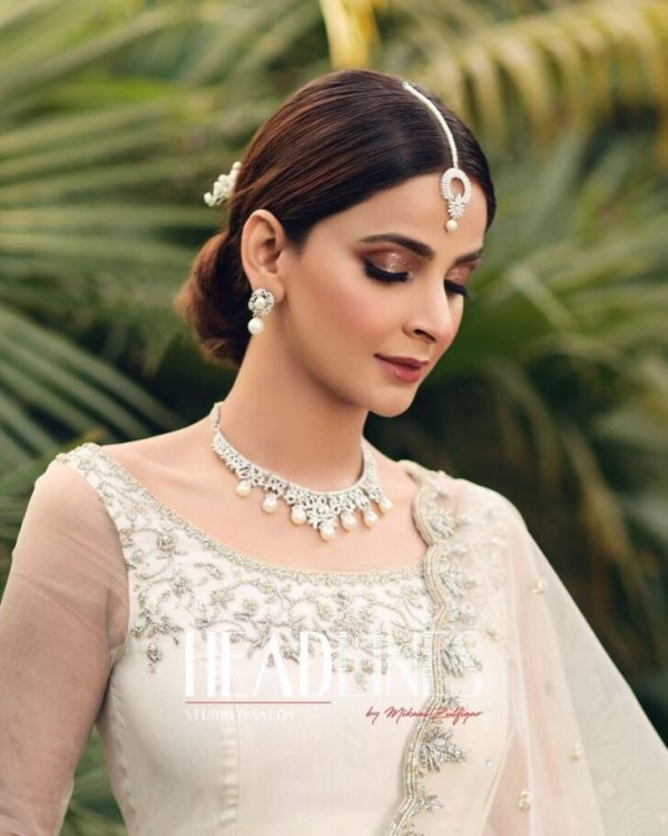 Saba Qamar recently took to Instagram to tell Headlines Official about the bride's amazing clicks. The actress looked ethereal in her all-white ivory ensemble. Fans can get a glimpse of Saba Qamar's wedding after announcing their relationship with Azeem Khan. Check out these beautiful clicks