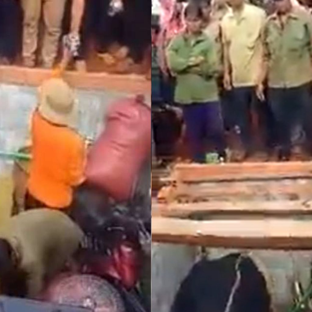 watch:-family-of-a-dead-man-stuffs-his-grave-with-fan,-motorbike,-tv-&-what-not!