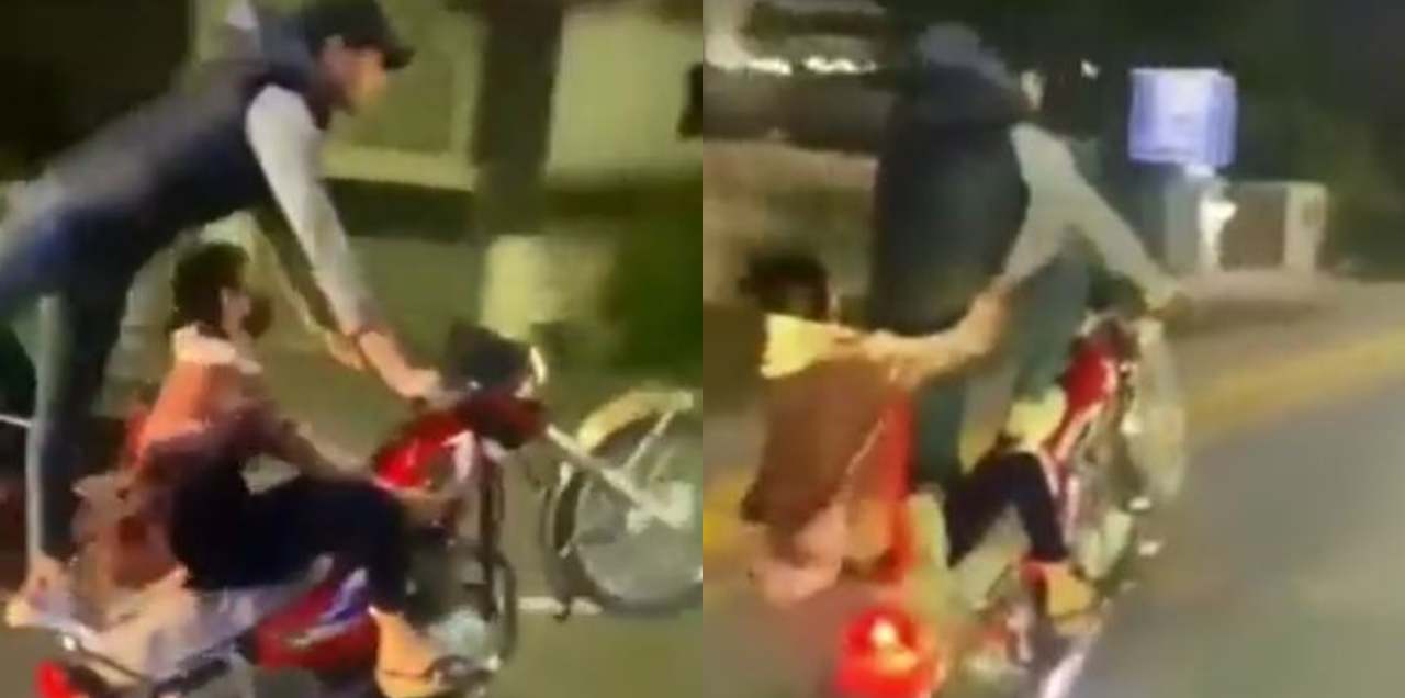 WATCH: Daredevil Couple Performs A One-Wheeling Stunt In Lahore