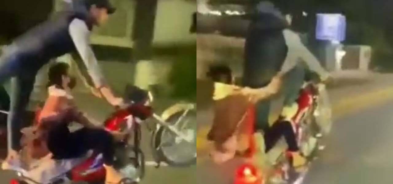 Couple Performs A One-Wheeling Stunt In Lahore