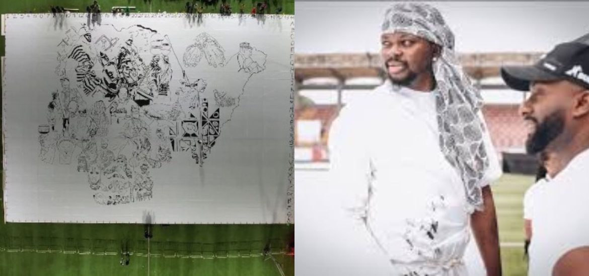 Nigerian Artist Fola David makes history; registering himself in the Guinness Book of World Records for the largest painting made.